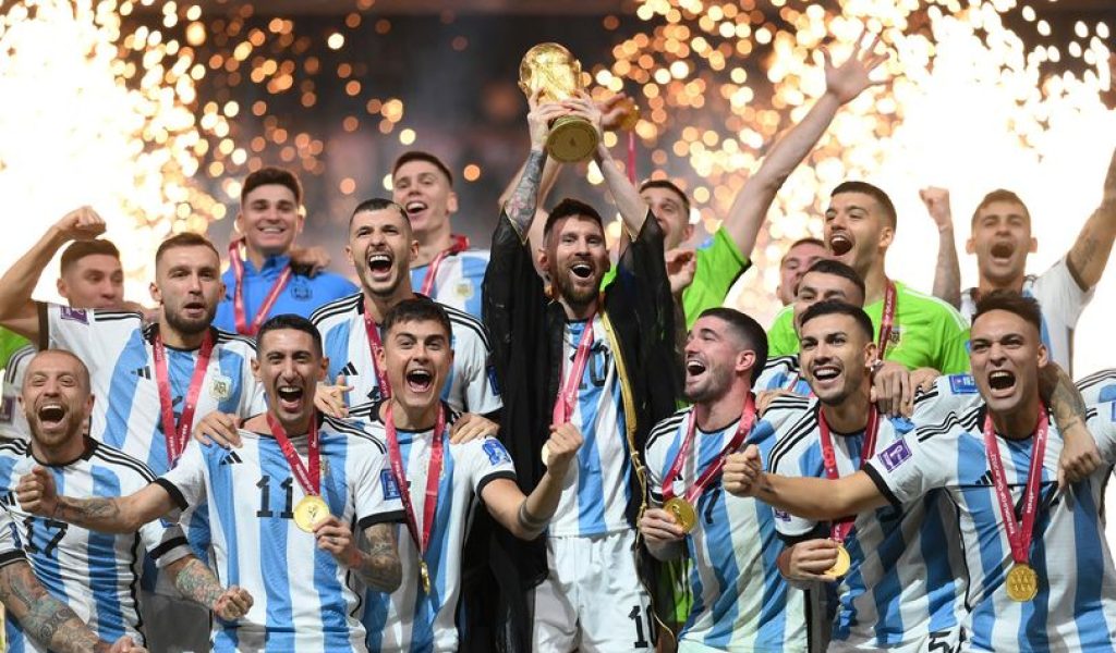 LUSAIL CITY, QATAR - DECEMBER 18: Lionel Messi of Argentina lifts the FIFA World Cup Qatar 2022 Winner's Trophy after the FIFA World Cup Qatar 2022 Final match between Argentina and France at Lusail Stadium on December 18, 2022 in Lusail City, Qatar. (Photo by Shaun Botterill - FIFA/FIFA via Getty Images)